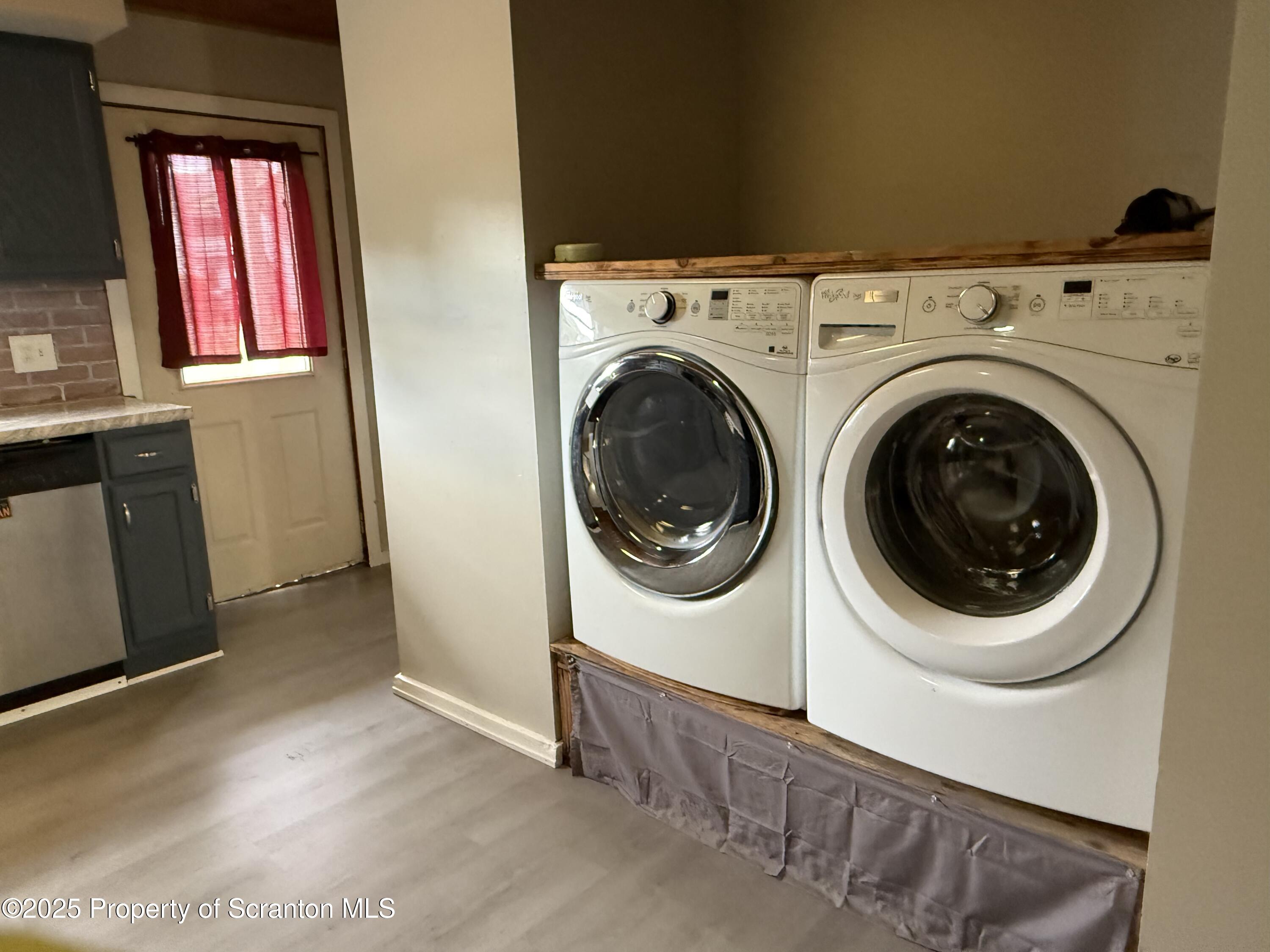 319 Green Street Scranton, PA 18508 - Photo 3 of 8 a utility room with dryer and washer