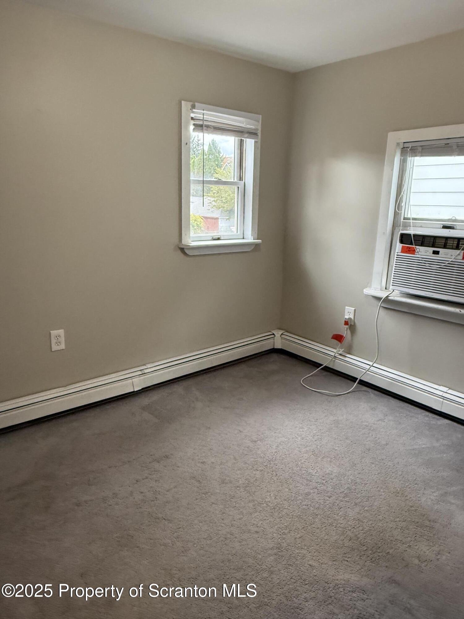 319 Green Street Scranton, PA 18508 - Photo 8 of 8 an empty room with a window