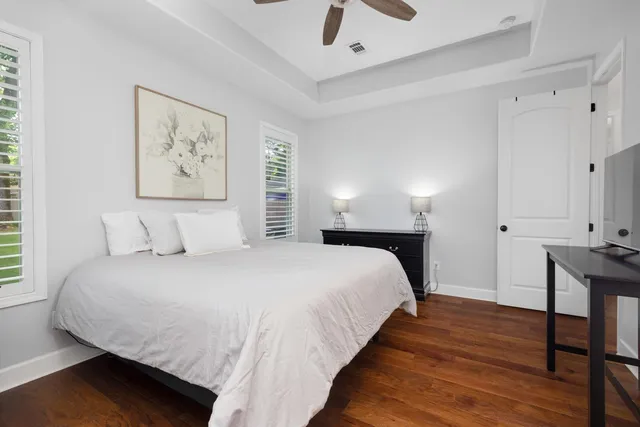 a bedroom with bed and window