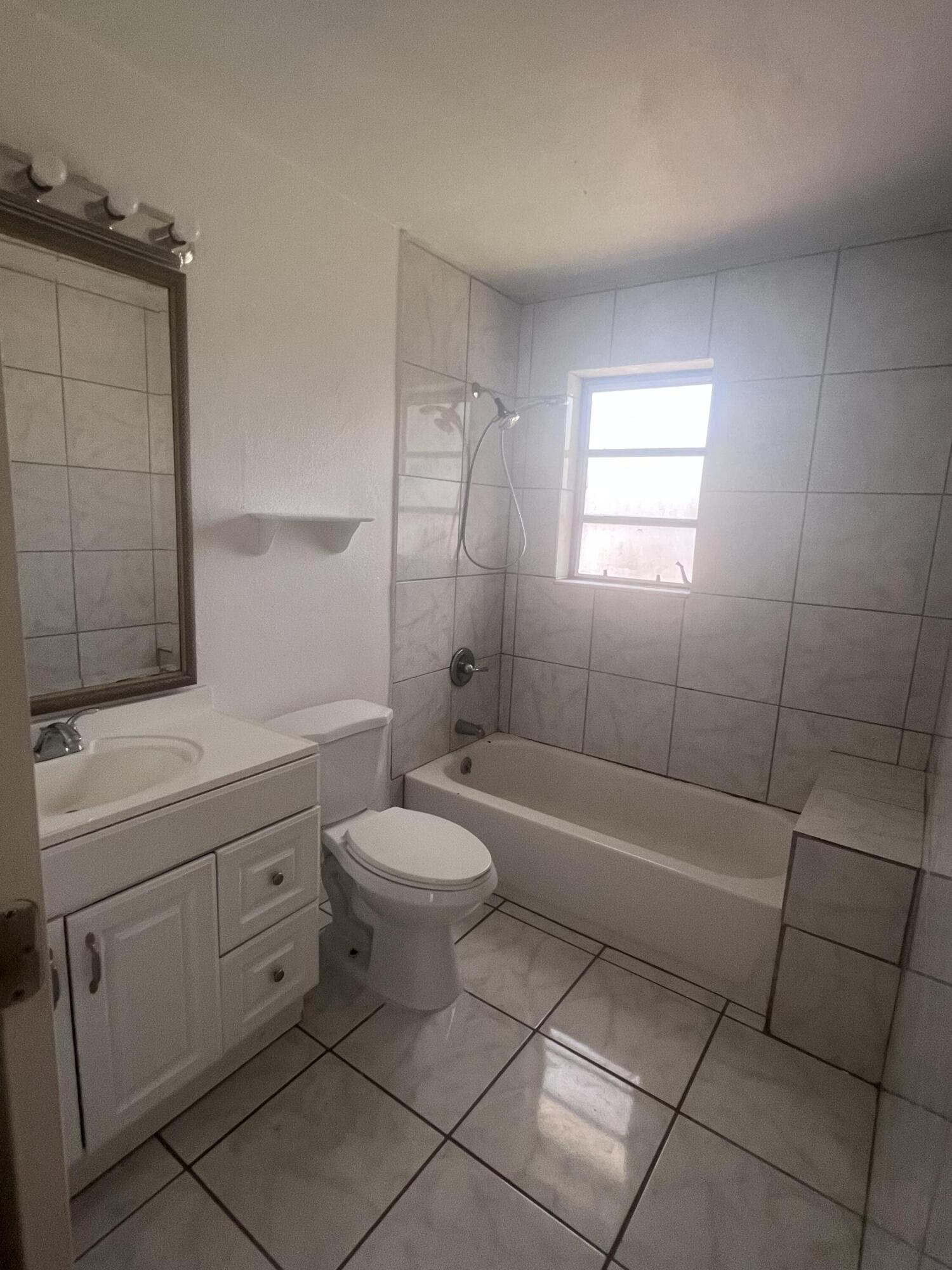 1530 Pine Tree Court Riviera Beach, FL 33404 - Photo 11 of 21 Master Bathroom