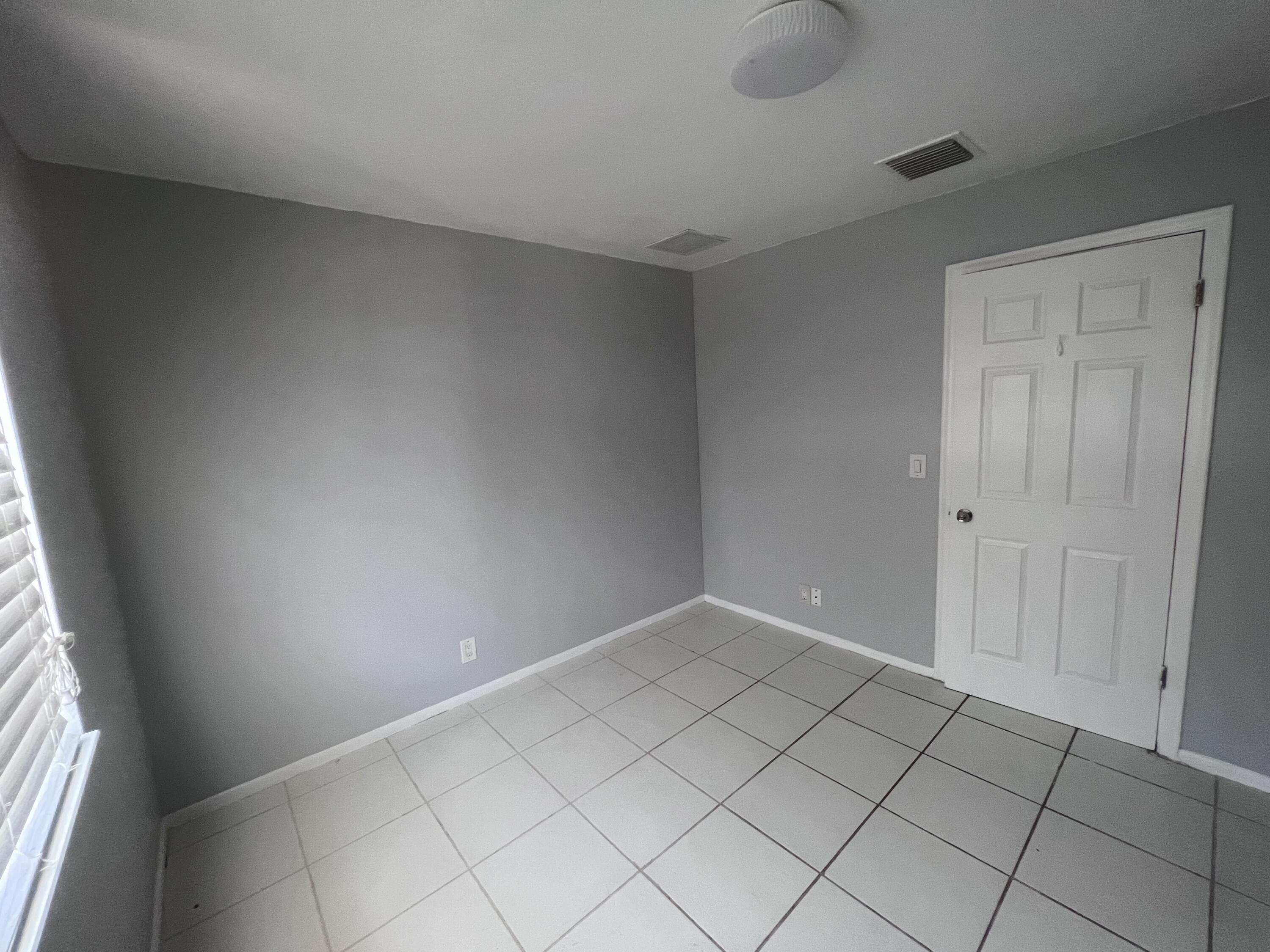 1530 Pine Tree Court Riviera Beach, FL 33404 - Photo 12 of 21 Guest Bedroom