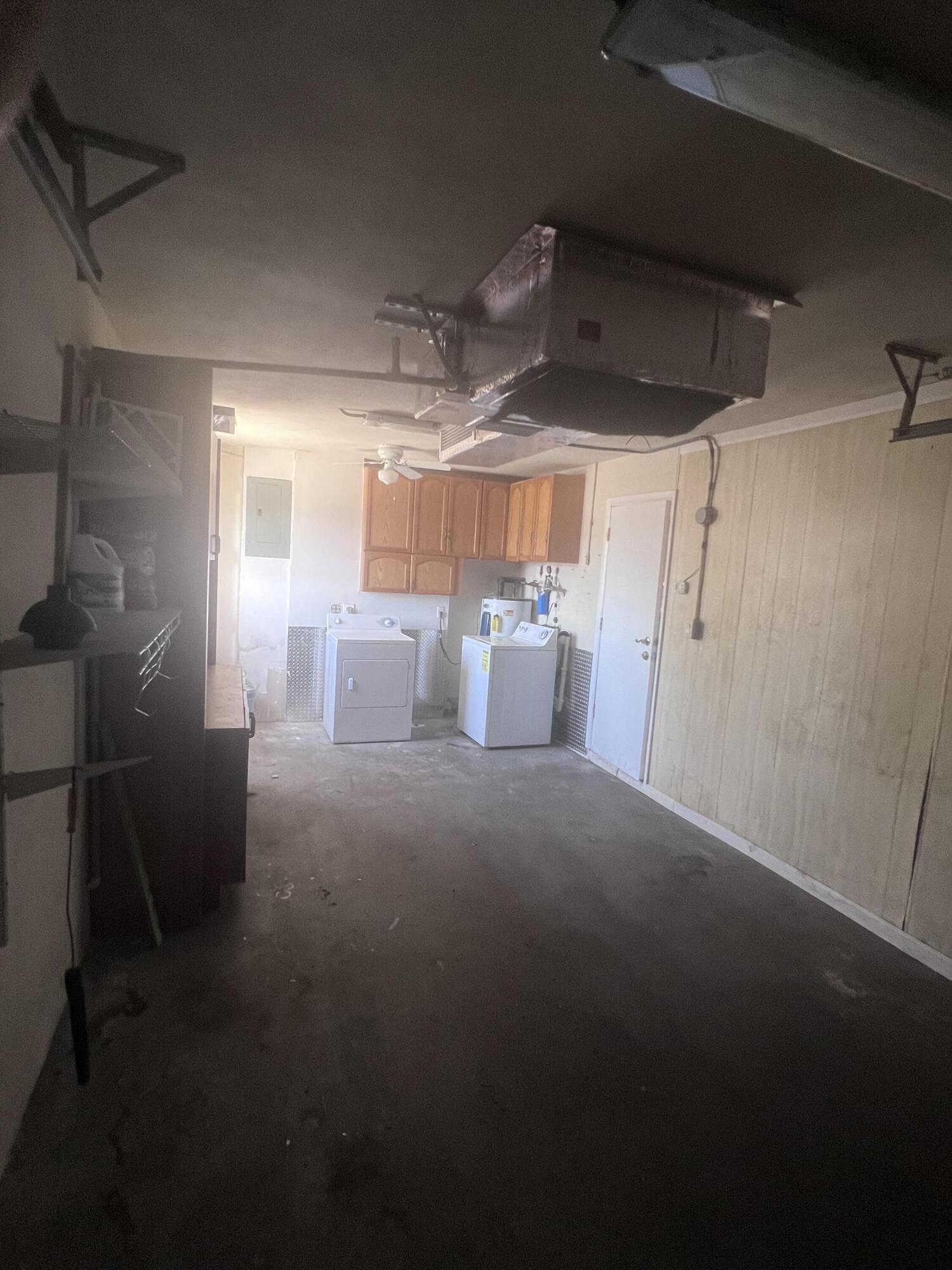 1530 Pine Tree Court Riviera Beach, FL 33404 - Photo 19 of 21 Garage
