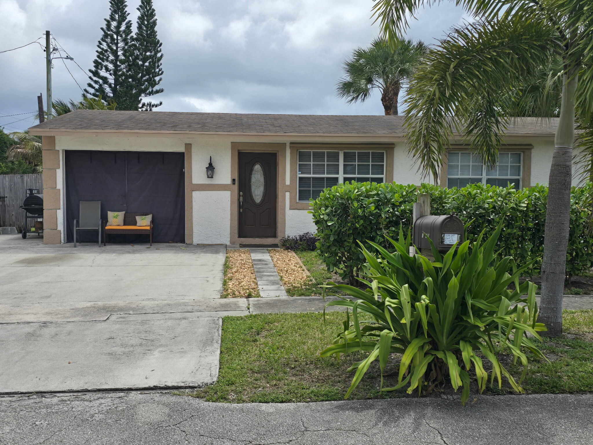 1530 Pine Tree Court Riviera Beach, FL 33404 - Photo 2 of 21 front 1