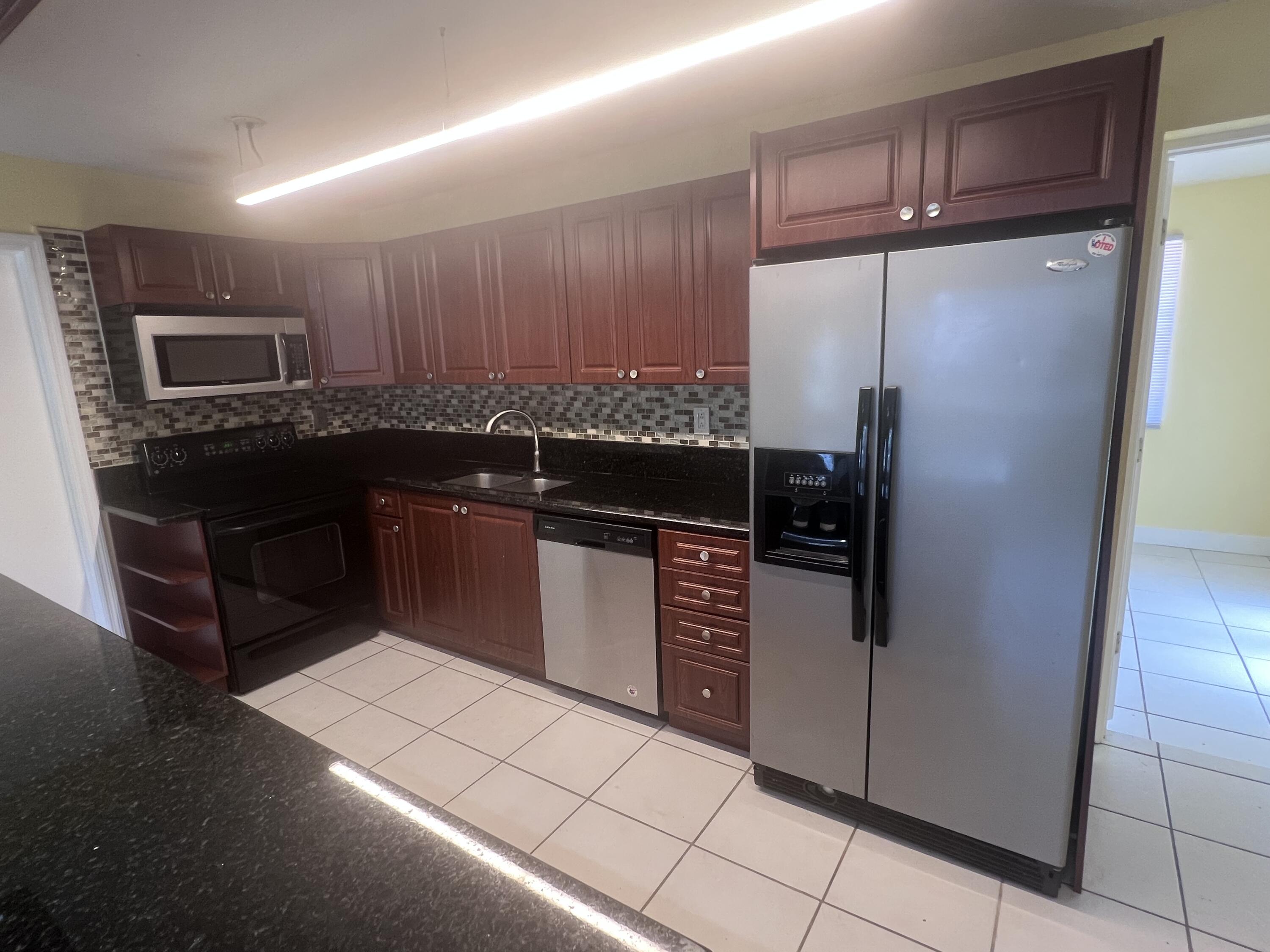 1530 Pine Tree Court Riviera Beach, FL 33404 - Photo 4 of 21 Kitchen
