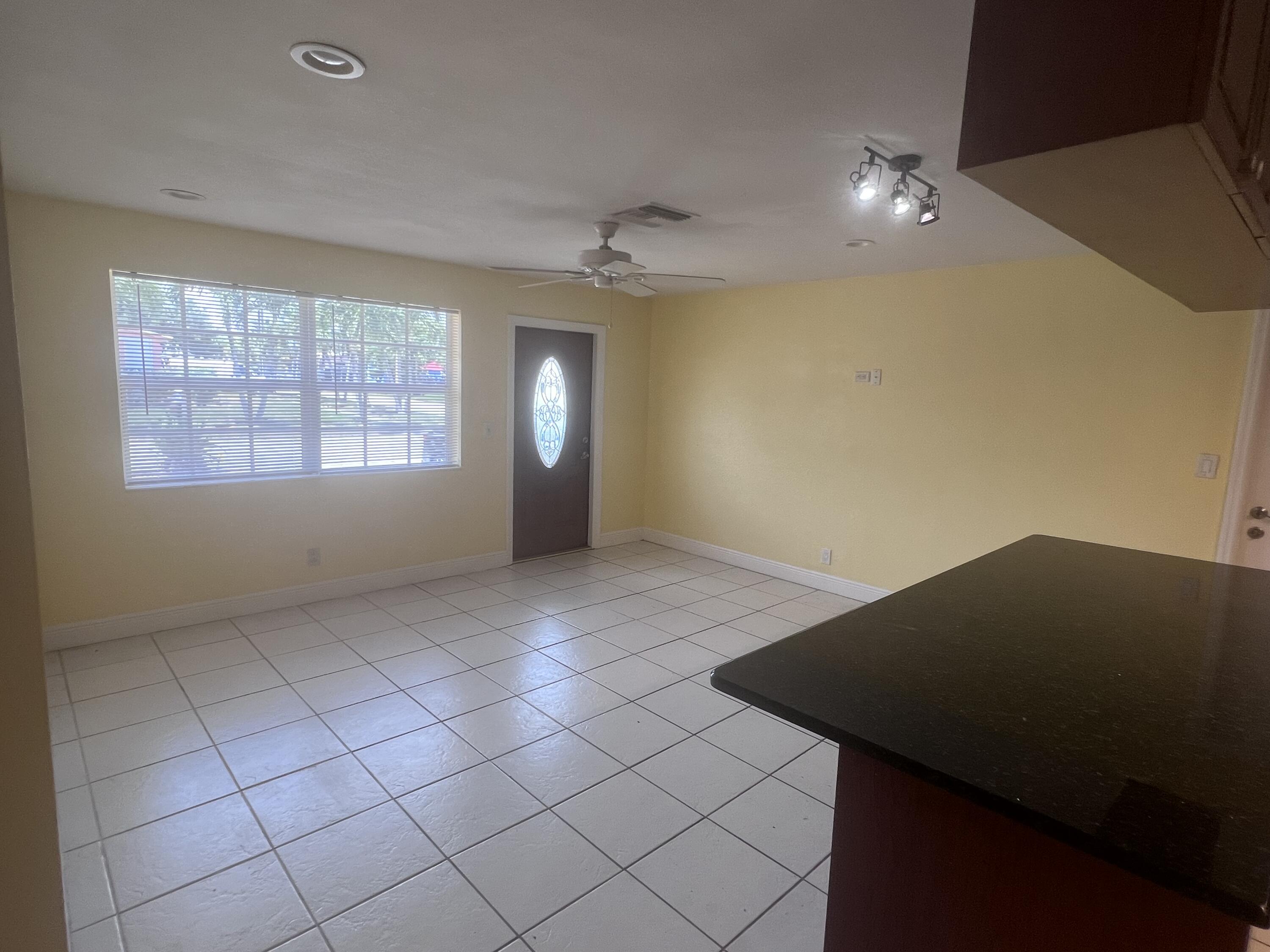 1530 Pine Tree Court Riviera Beach, FL 33404 - Photo 7 of 21 Living Room
