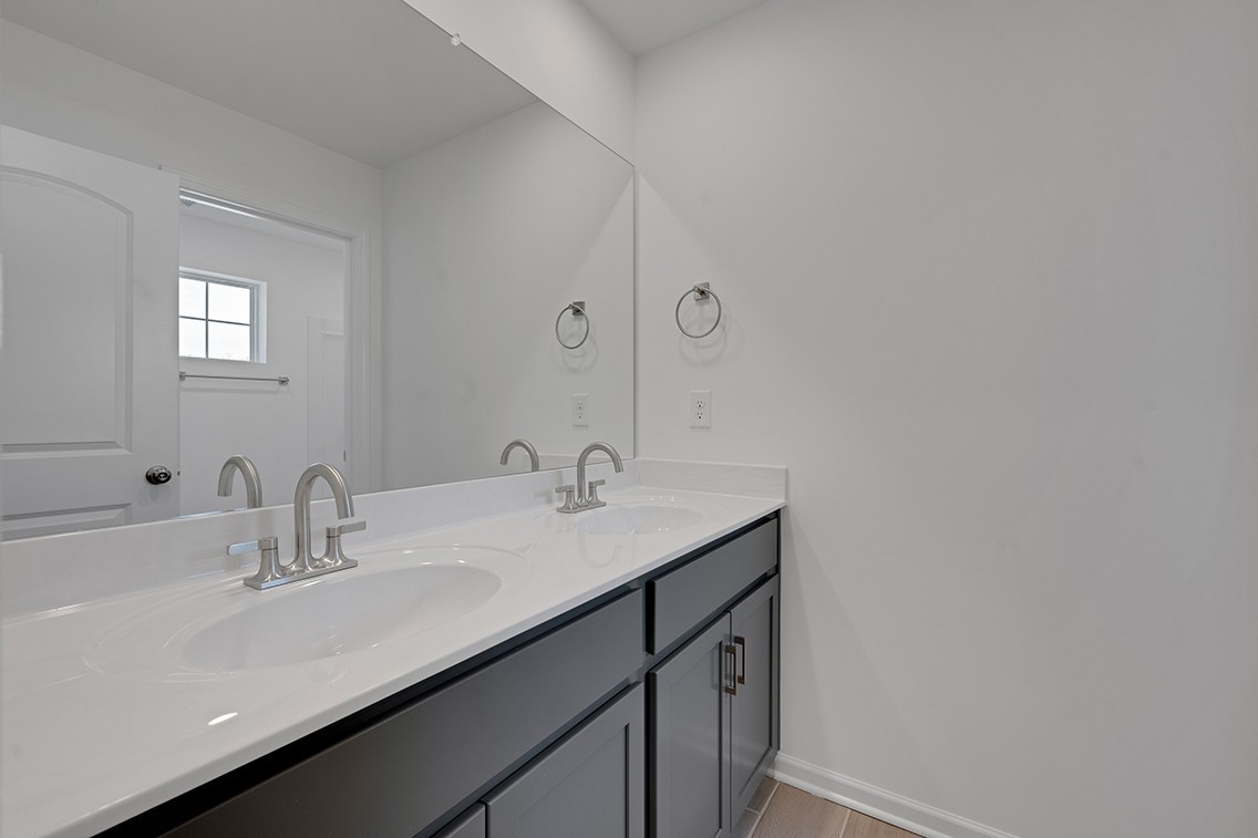 5305 Carnegie Road Old Hickory, TN 37138 - Photo 25 of 32 a bathroom with a sink and a mirror