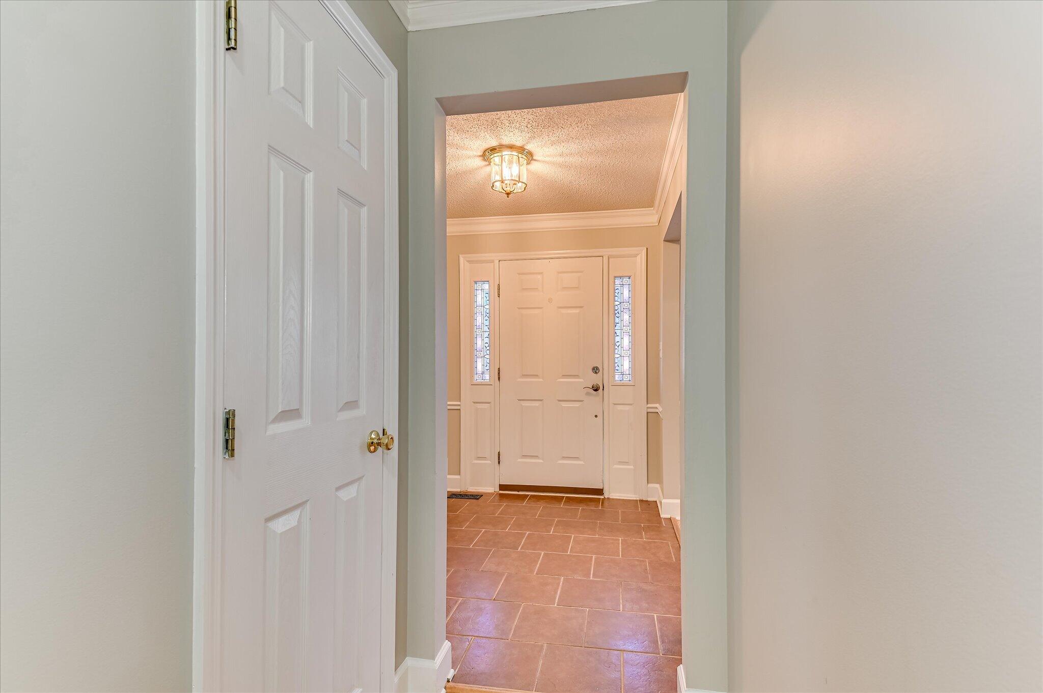 4686 Perry Mill Circle Grovetown, GA 30813 - Photo 13 of 57 Hallway from greatroom to foyer with half bathroom to the left