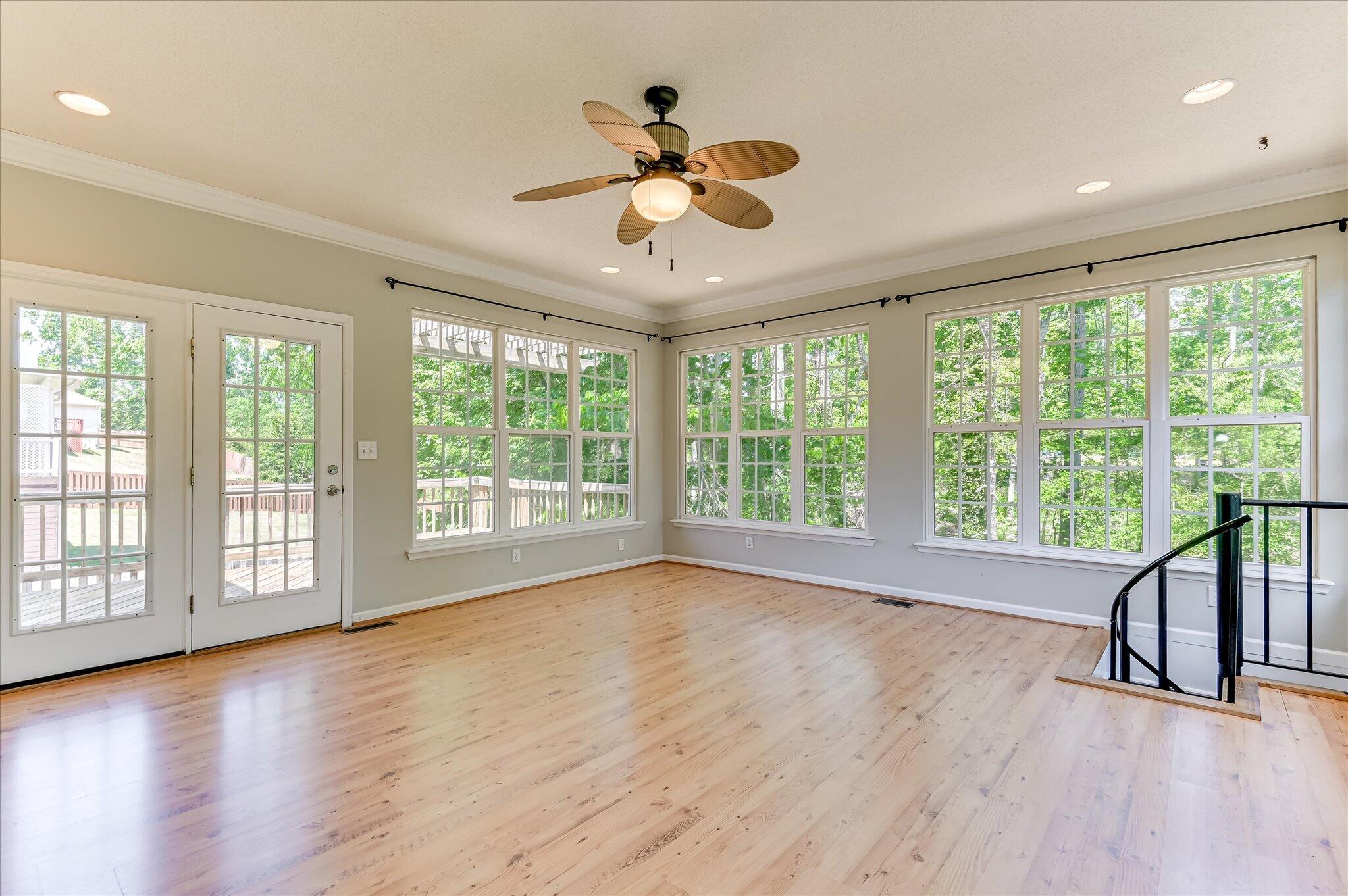 4686 Perry Mill Circle Grovetown, GA 30813 - Photo 19 of 57 Sunroom with spiral stairs leading to downstairs basement bedroom/flex room