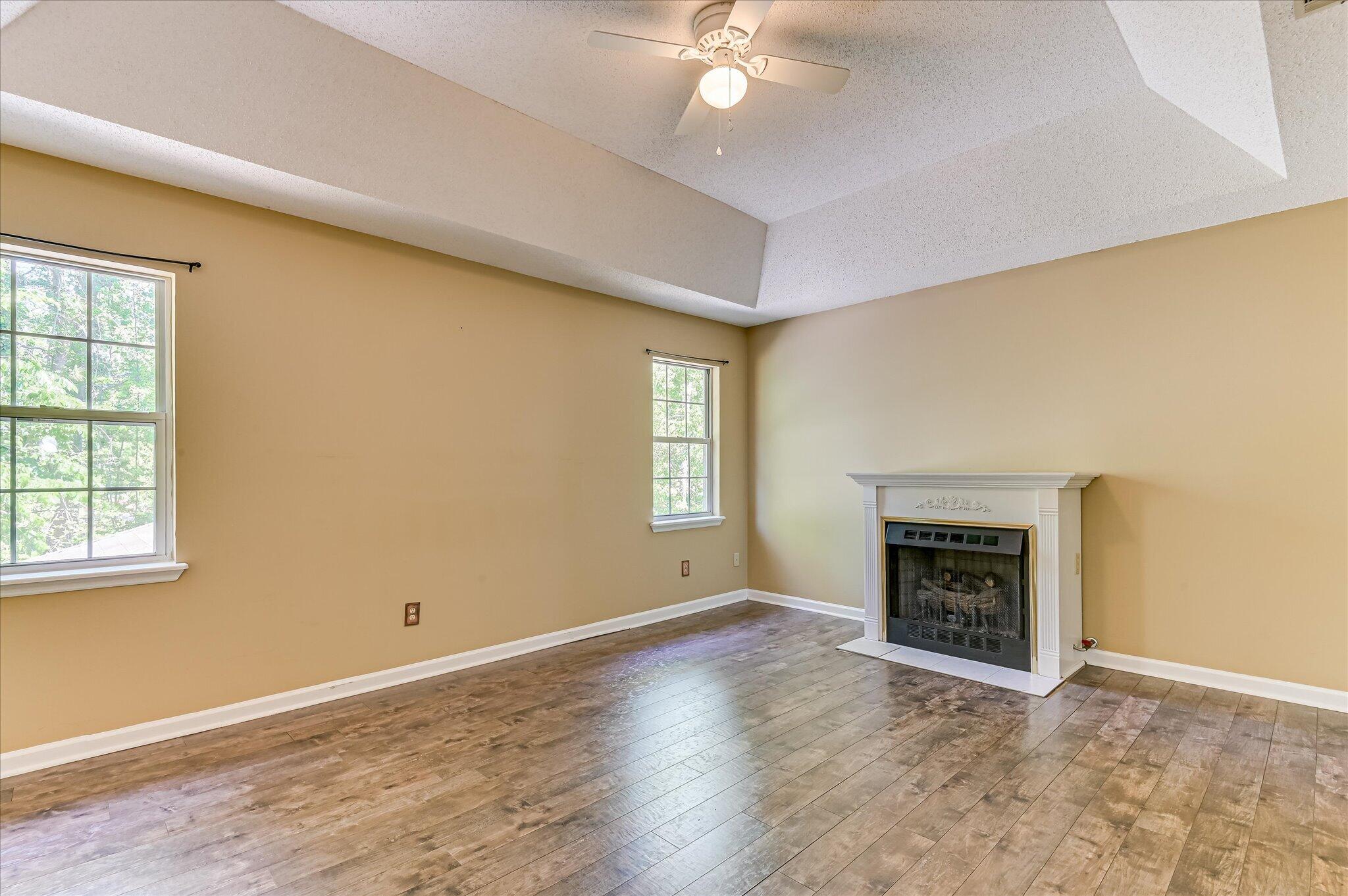 4686 Perry Mill Circle Grovetown, GA 30813 - Photo 32 of 57 Primary bedroom with fireplace