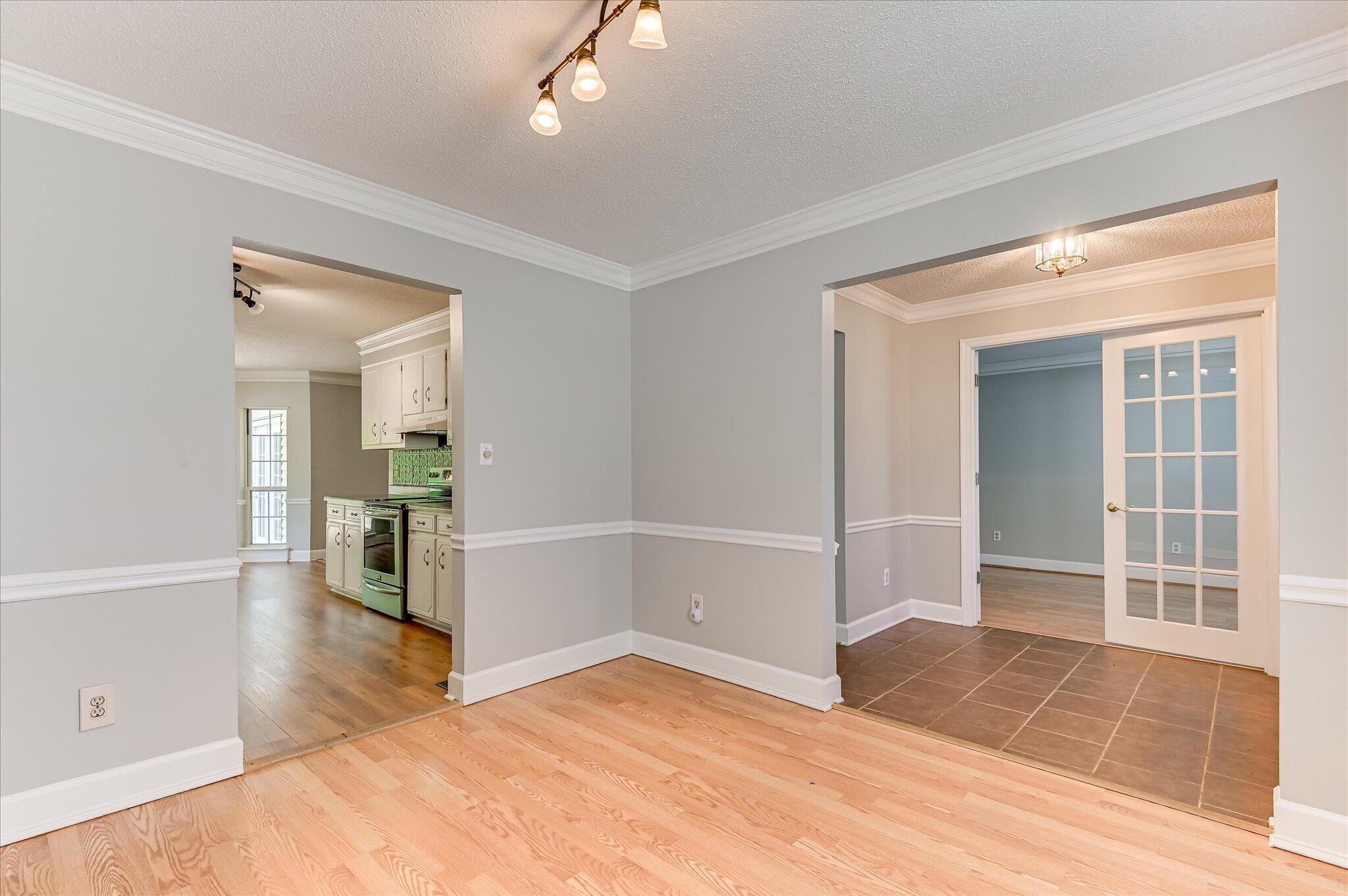 4686 Perry Mill Circle Grovetown, GA 30813 - Photo 7 of 57 Formal dining room with view of foyer and living room/flex room and and kitchen to the left