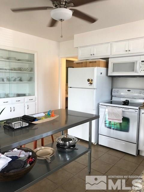 785-795 Roberts Street, Unit 795B Reno, NV 89502 - Photo 8 of 25 a kitchen with a sink and a stove