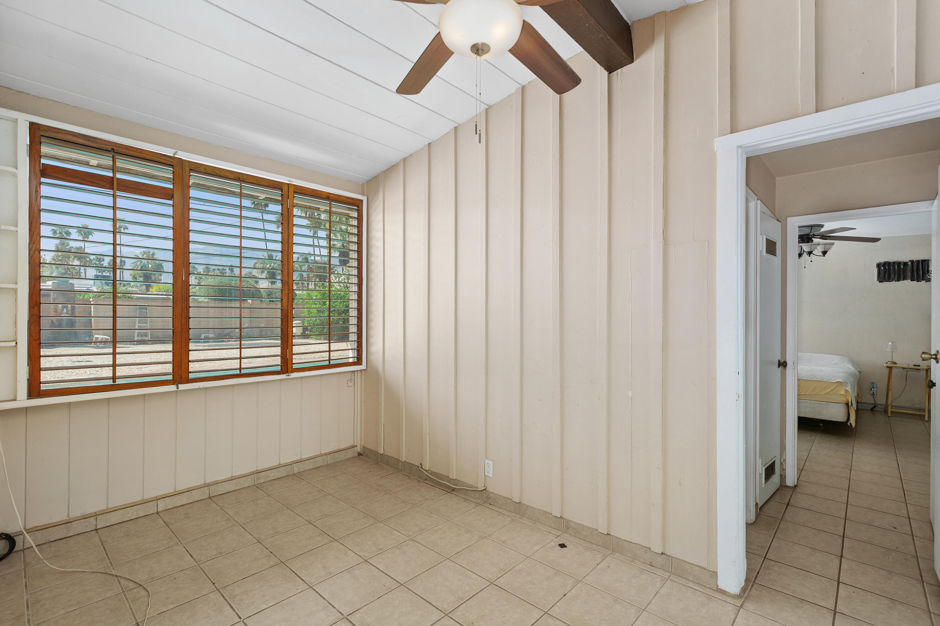 1077 South Riverside Drive Palm Springs, CA 92264 - Photo 23 of 35 a view of an empty room with a window