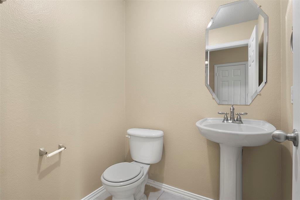 2113 Glen Manor Road Corinth, TX 76208 - Photo 21 of 36 Downstairs half bathroom