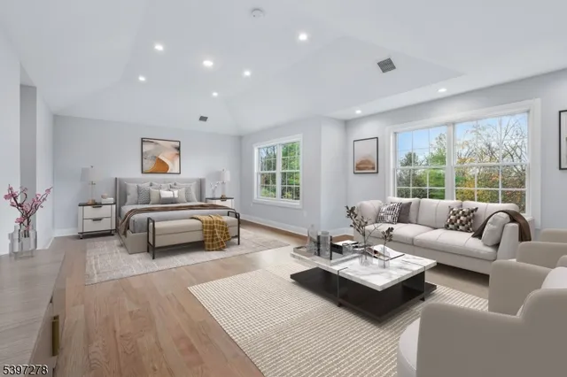 a view of kitchen with furniture and wooden floor