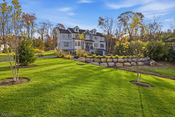 a view of a house with a big yard