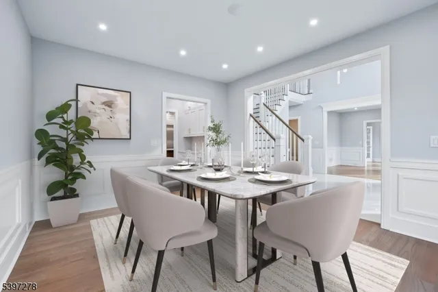 a view of kitchen with furniture and wooden floor