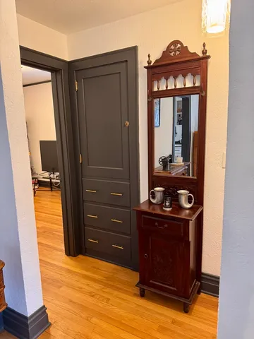 a view of dresser and mirror