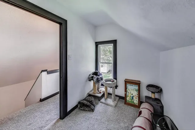 a bathroom with a shower and a sink