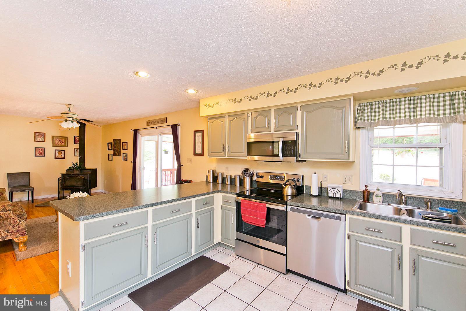 4001 Back Creek Road High View, VA 26808 - Photo 6 of 32 Spacious kitchen and family room with wood stove.