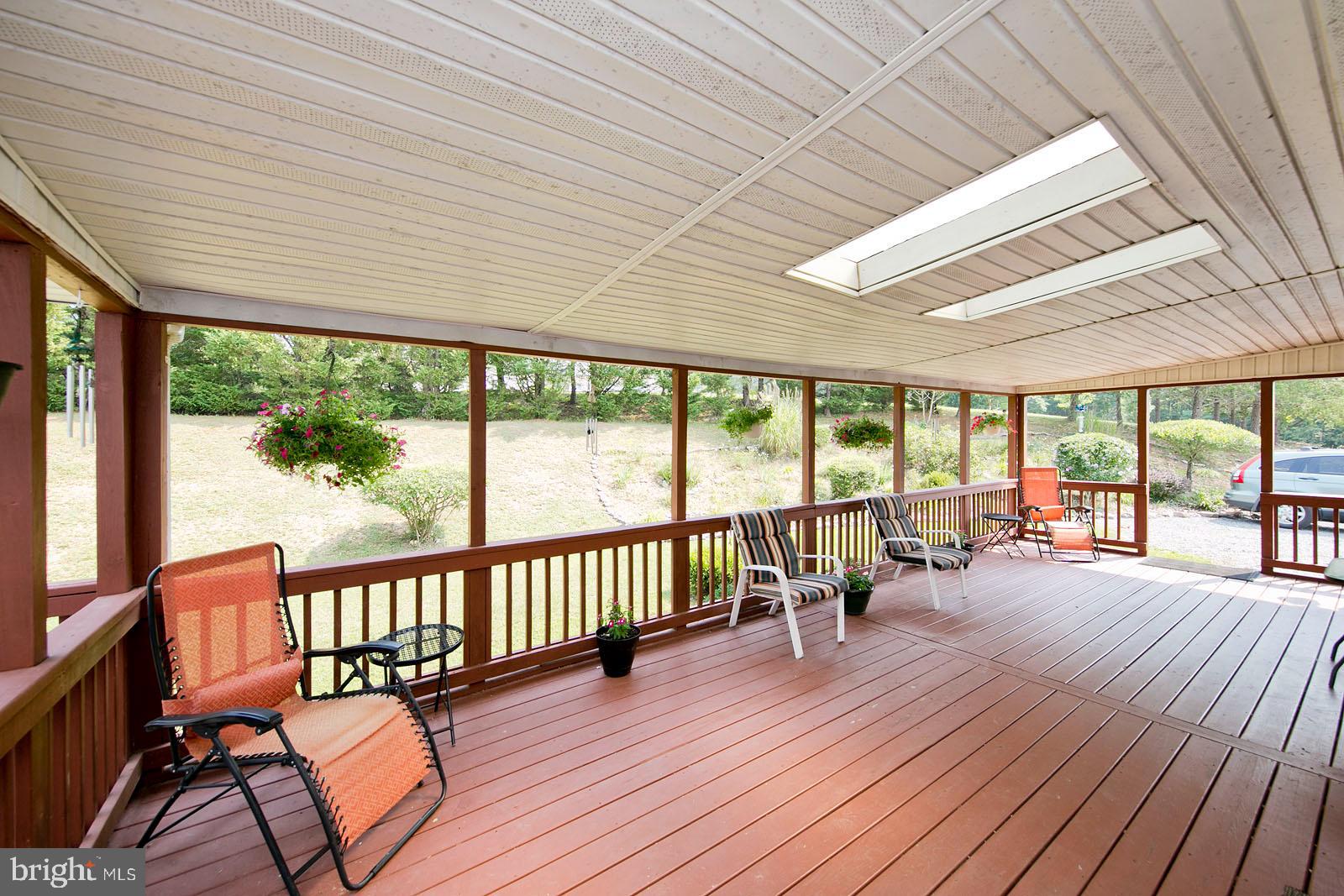 4001 Back Creek Road High View, VA 26808 - Photo 8 of 32 Huge covered deck for outdoor living.