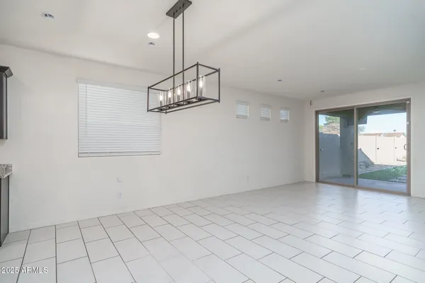a kitchen with a sink a counter space and stainless steel appliances