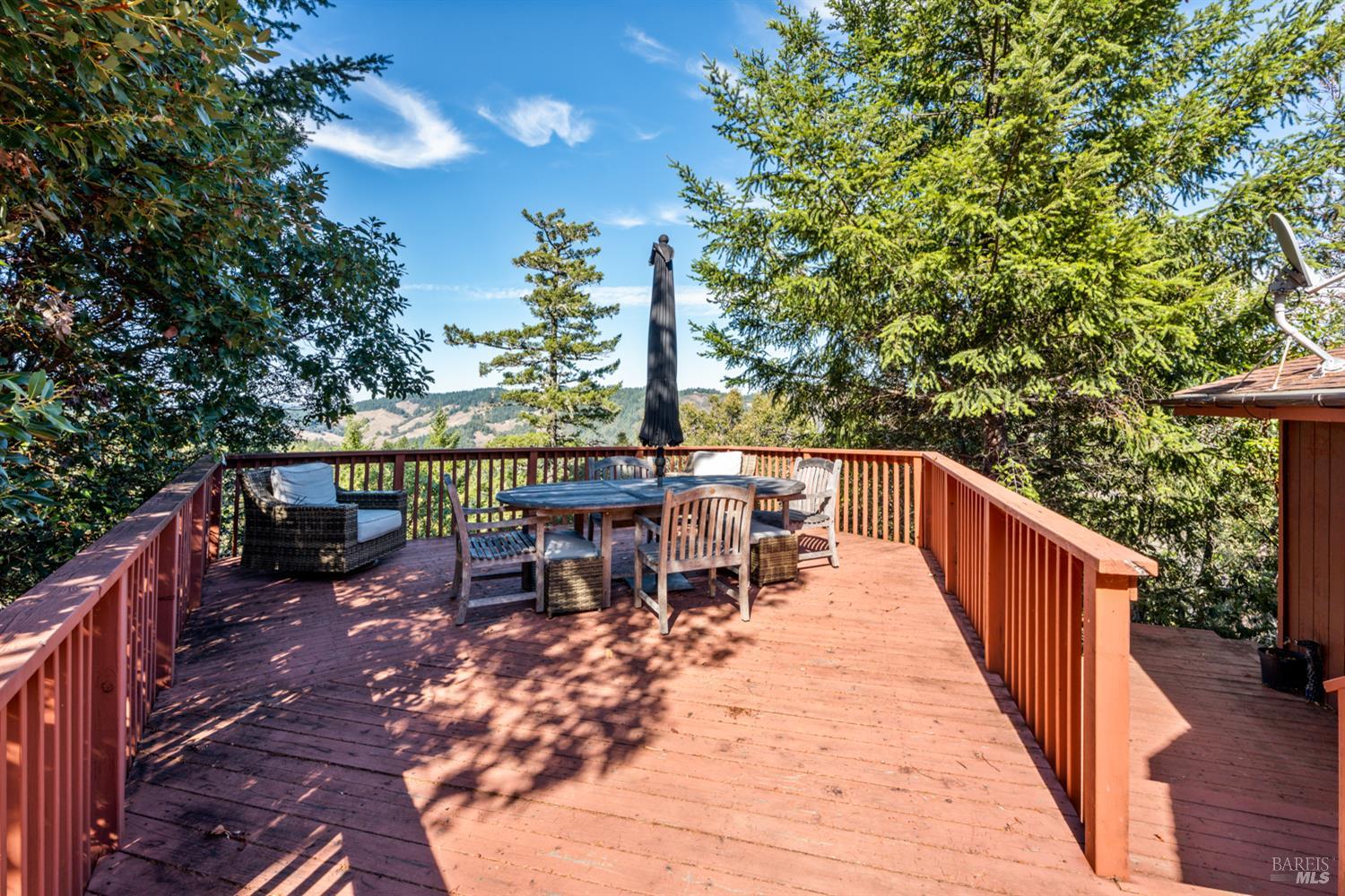 16460 Walker Lake Road Willits, CA 95490 - Photo 19 of 23 a view of a patio with a table and chairs