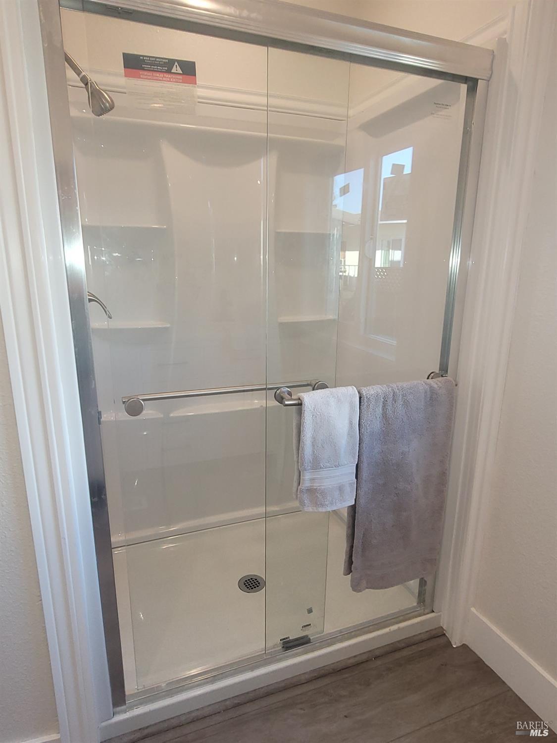 839 Nonie Street Santa Rosa, CA 95403 - Photo 11 of 23 a bathroom with a glass shower door