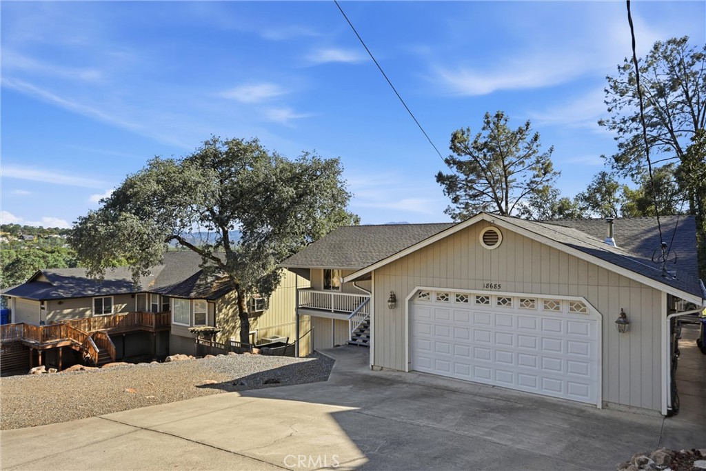 18685 Oak Grove Road Hidden Valley Lake, CA 95467 - Photo 31 of 52 a view of a house with a yard