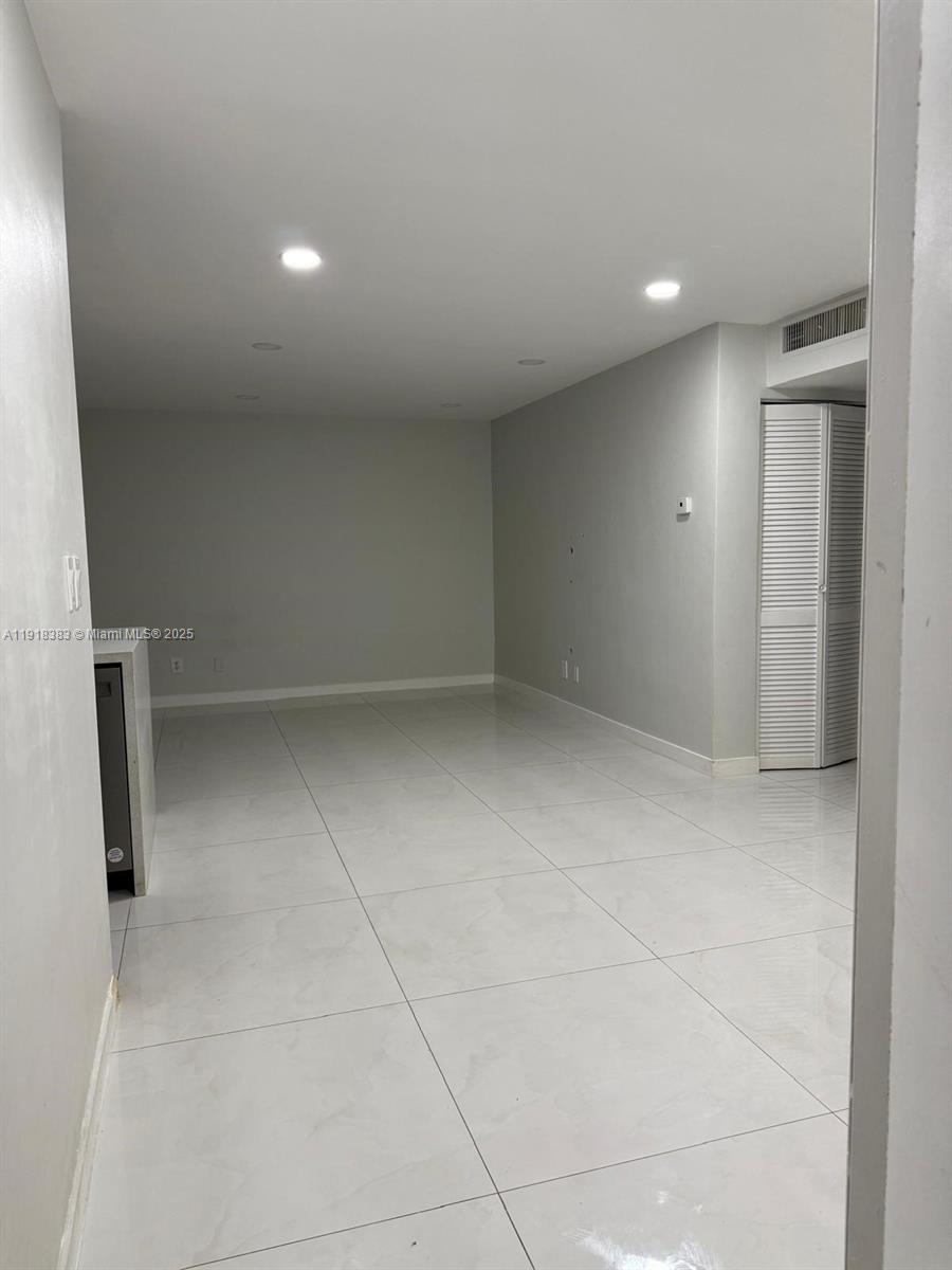 2461 Southwest 82nd Avenue, Unit 105 Davie, FL 33324 - Photo 13 of 17 a view of an empty room