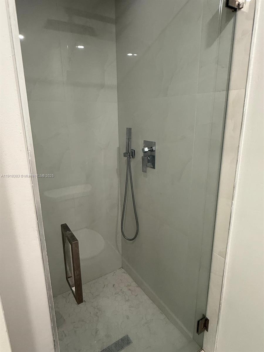 2461 Southwest 82nd Avenue, Unit 105 Davie, FL 33324 - Photo 14 of 17 a bathroom with a shower