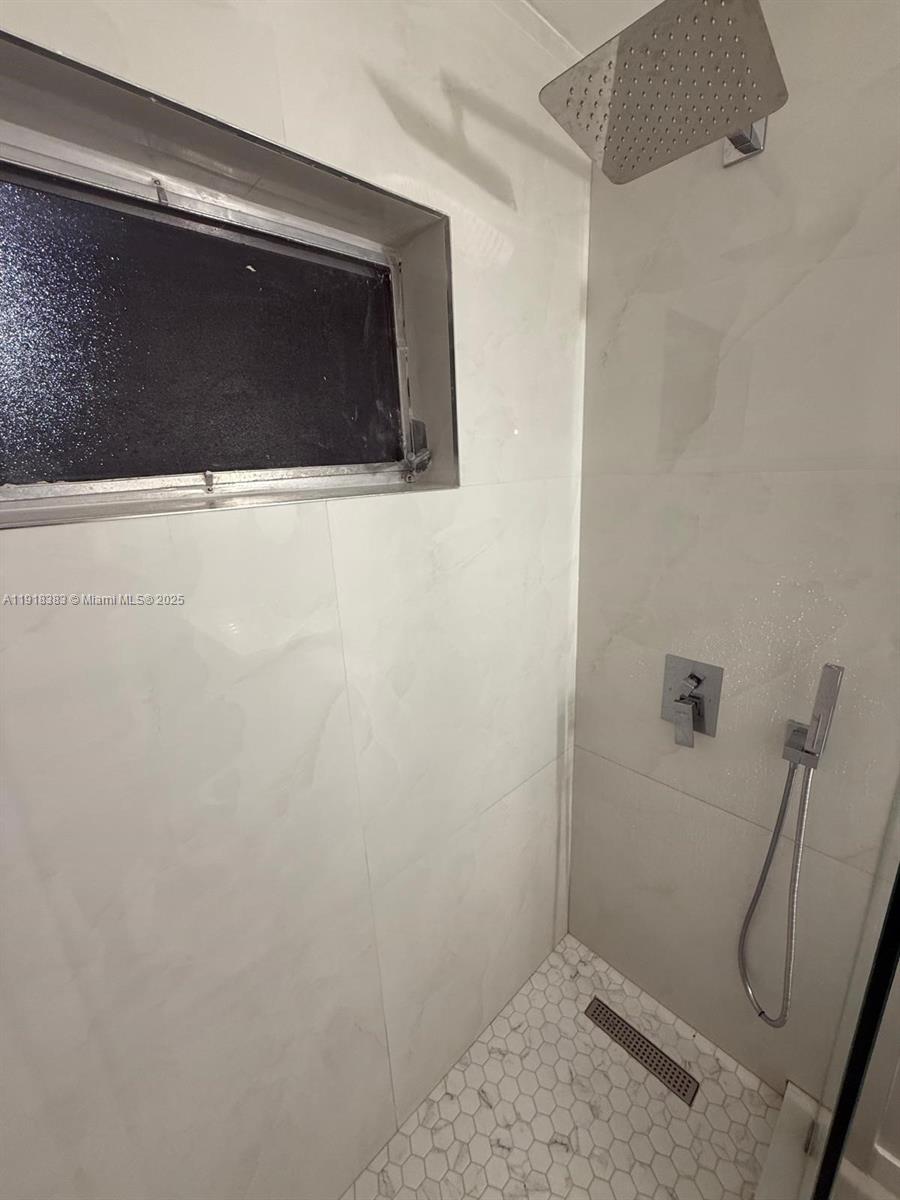 2461 Southwest 82nd Avenue, Unit 105 Davie, FL 33324 - Photo 7 of 17 a bathroom with a sink