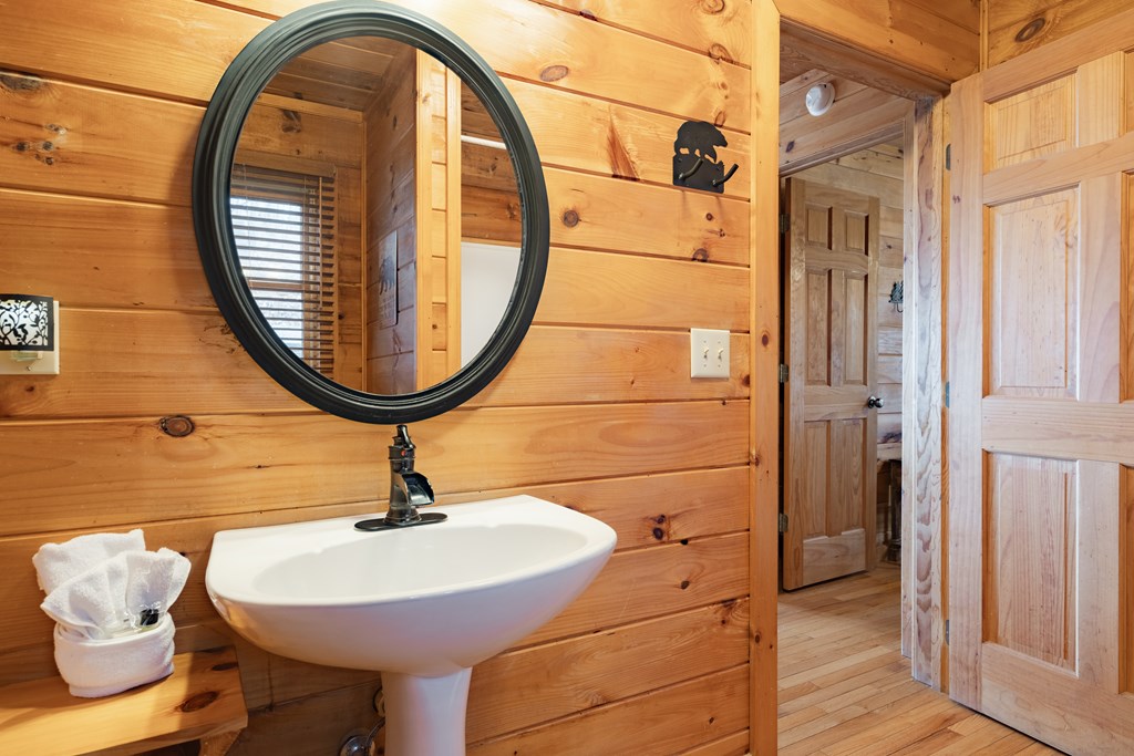 472 Timber Ridge Blue Ridge, GA 30513 - Photo 35 of 63 a bathroom with a sink and a mirror