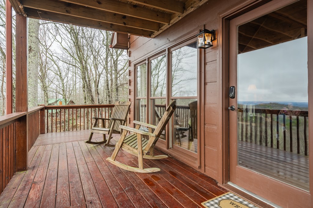 472 Timber Ridge Blue Ridge, GA 30513 - Photo 54 of 63 a view of balcony with wooden floor and fence