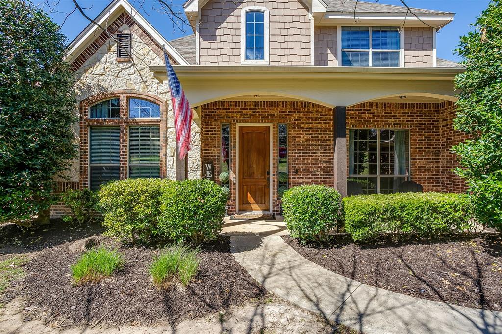 43 Crown Road Willow Park, TX 76087 - Photo 3 of 40 a front view of a house with garden