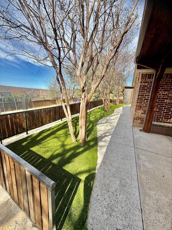 43 Crown Road Willow Park, TX 76087 - Photo 32 of 40 a view of a backyard with two chairs