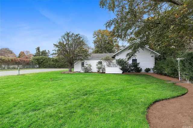 a view of a backyard with garden