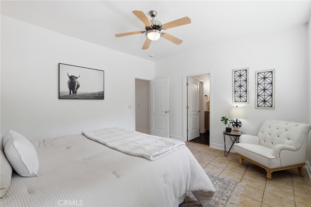 451 Hideaway Chico, CA 95926 - Photo 20 of 33 a spacious bedroom with a bed and a couch