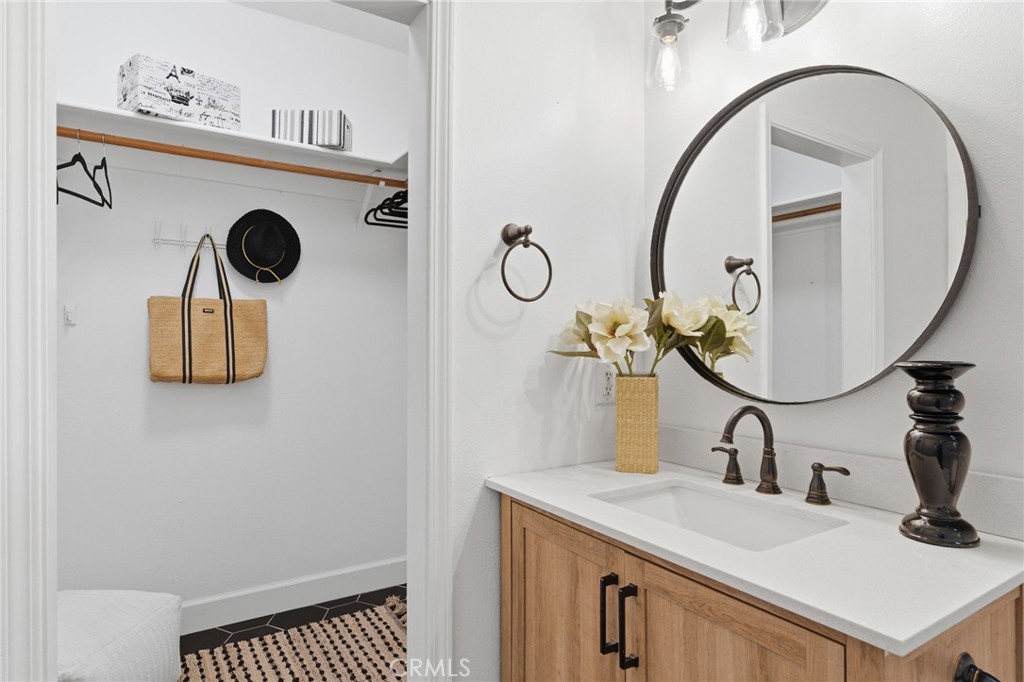 451 Hideaway Chico, CA 95926 - Photo 22 of 33 a bathroom with a sink and a mirror