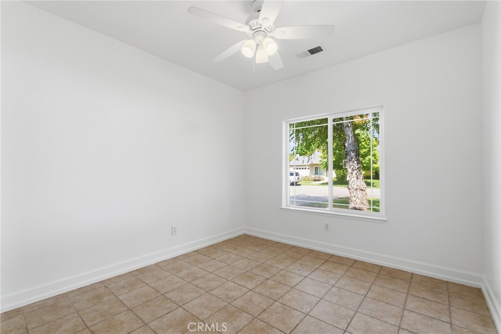 451 Hideaway Chico, CA 95926 - Photo 24 of 33 an empty room with windows and fan