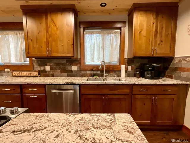 a bathroom with a sink vanity and a mirror