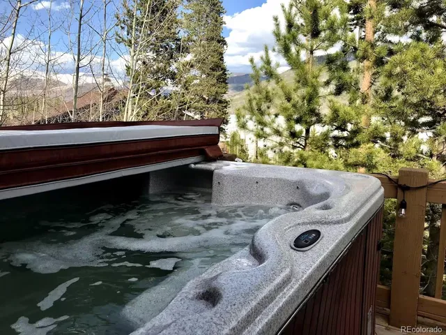 a view of a backyard with a sink and stove