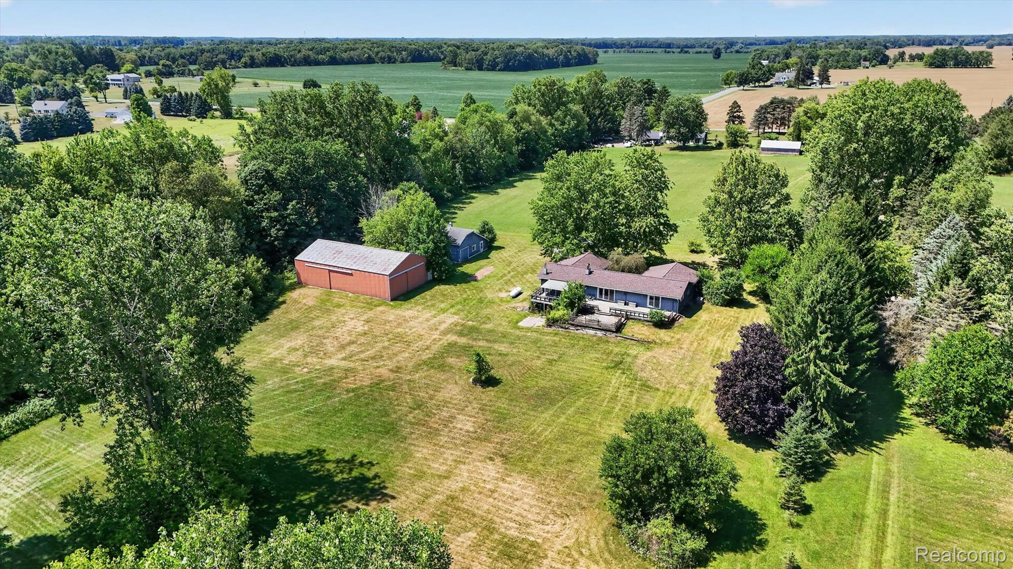 3760 Webberville Road North Williamston, MI 48895 - Photo 70 of 80 Expansive property with a single-story residence and a detached red barn