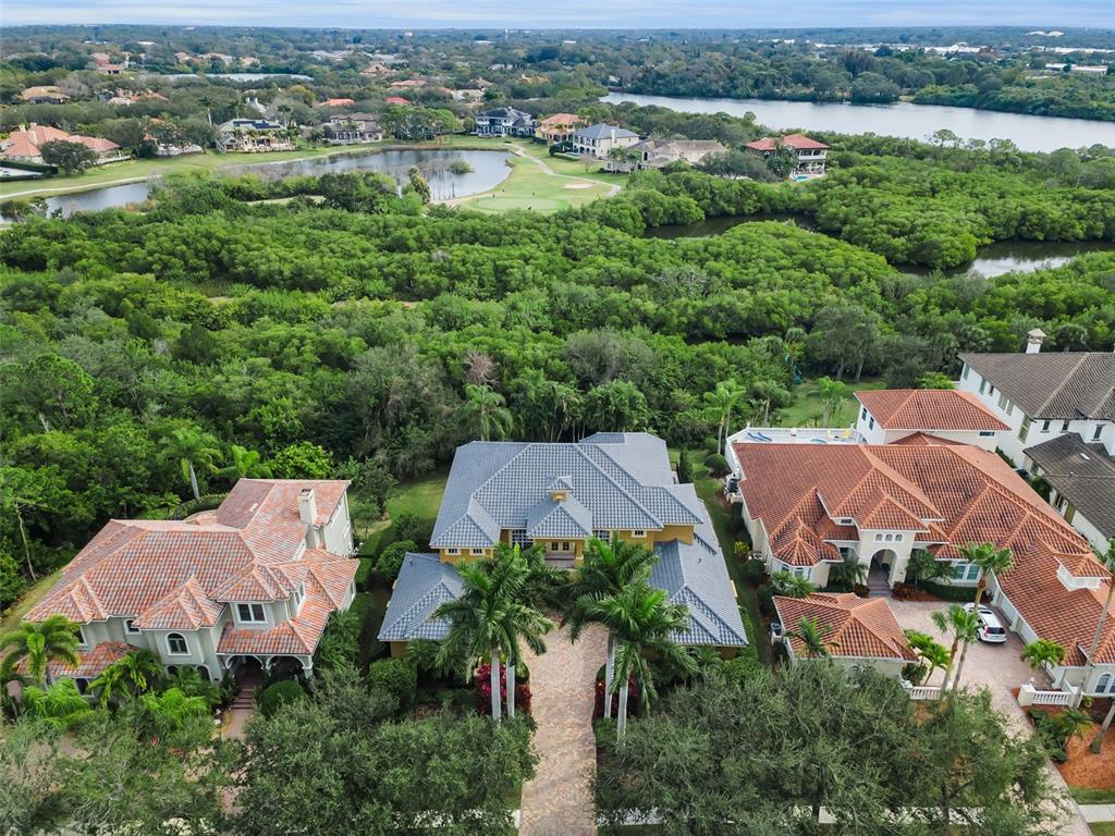 8871 Silverthorn Road Seminole, FL 33777 - Photo 14 of 98 an aerial view of a house with outdoor space and lake view