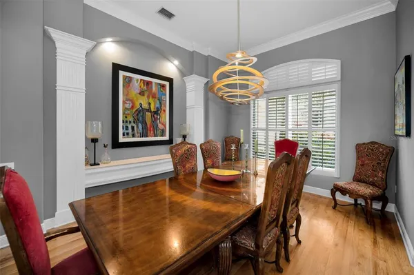 a view of a dining room with furniture window and outside view