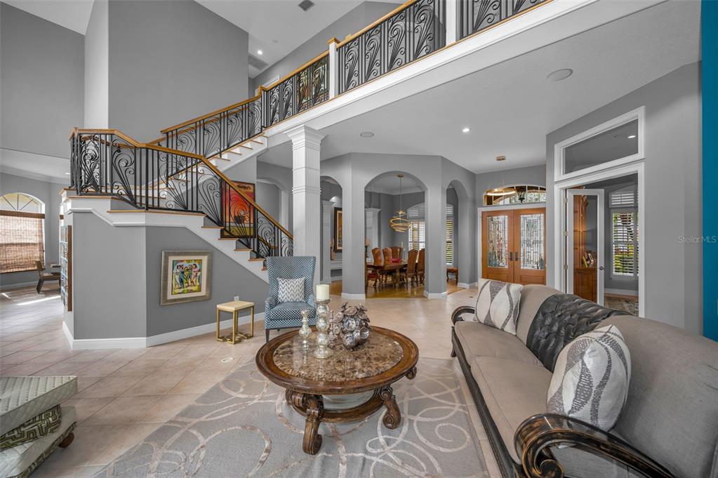 8871 Silverthorn Road Seminole, FL 33777 - Photo 26 of 98 a living room with furniture and a large window