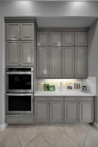 a view of a park with potted plants