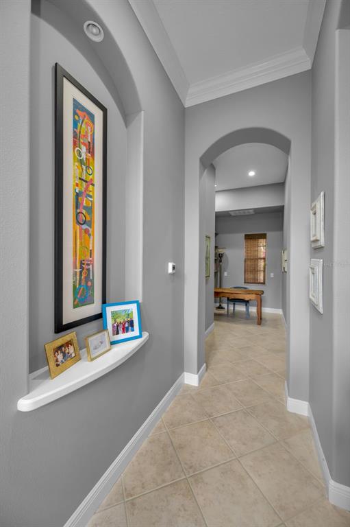 8871 Silverthorn Road Seminole, FL 33777 - Photo 40 of 98 a view of an entryway with wooden floor