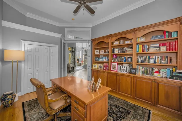 a view of patio with couches and a fire pit