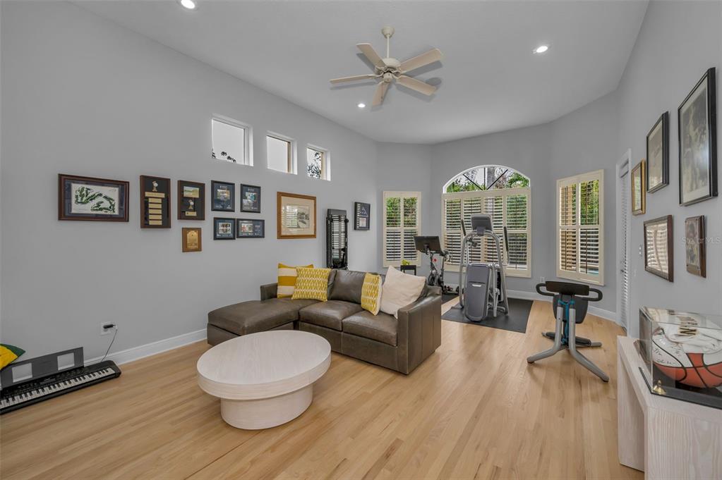 8871 Silverthorn Road Seminole, FL 33777 - Photo 44 of 98 a living room with furniture and a large window