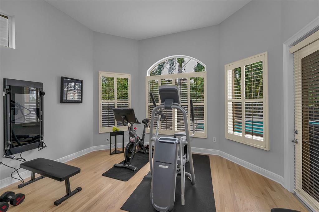 8871 Silverthorn Road Seminole, FL 33777 - Photo 45 of 98 a view of a livingroom with workspace and a window